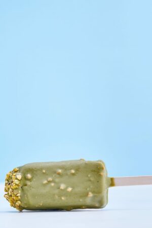 Pistachio ice cream on stick